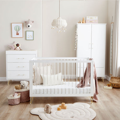 Babymore Kimi Acrylic 3-Piece Room Set in a beige nursery with pink accents