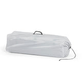 Ickle Bubba Scout 2-in-1 Travel Cot and Playpen placed in the included durable carry bag