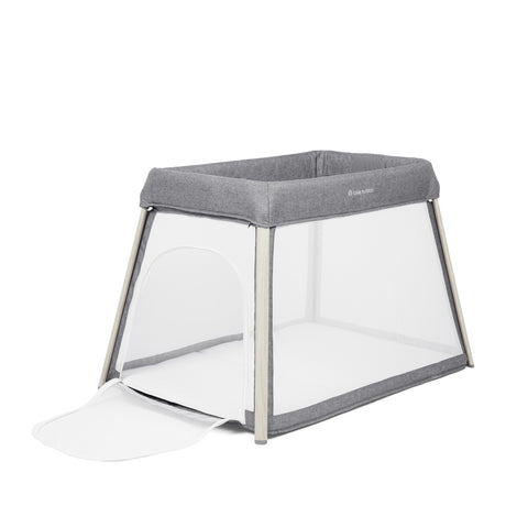 Angled left view of Ickle Bubba Scout 3-in-1 Travel Crib, Cot and Playpen with opened zip door 