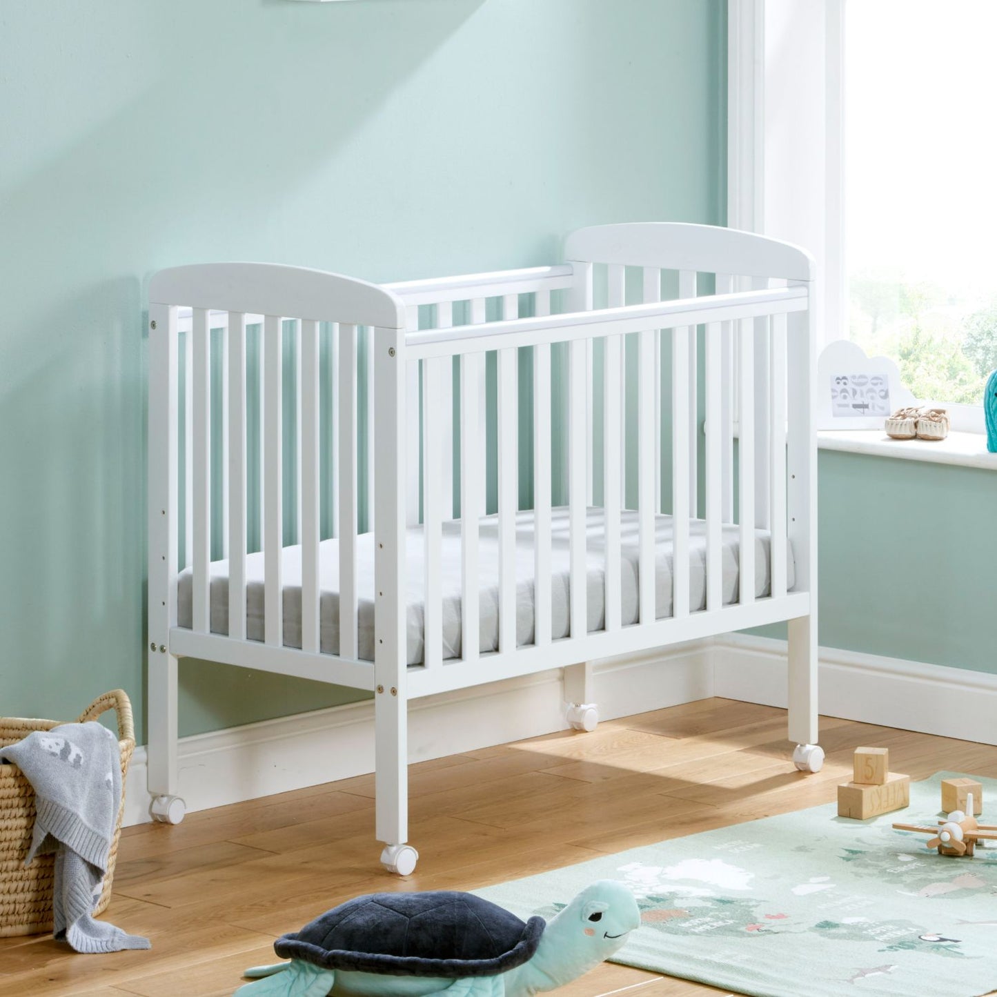 Babymore Space Saver Cot - Compact Size - Teething Rail (0-12months)