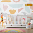 Colourful nursery room with an Ickle Bubba Coleby Classic Cot Bed with Under Drawer