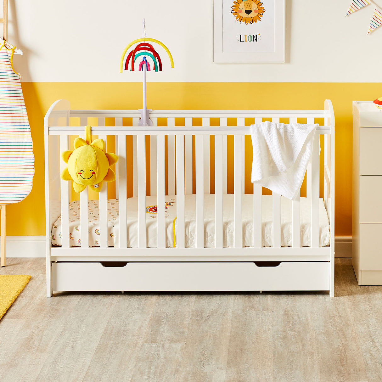 Ickle Bubba Coleby Classic Cot Bed with Under Drawer in a bright yellow nursery room