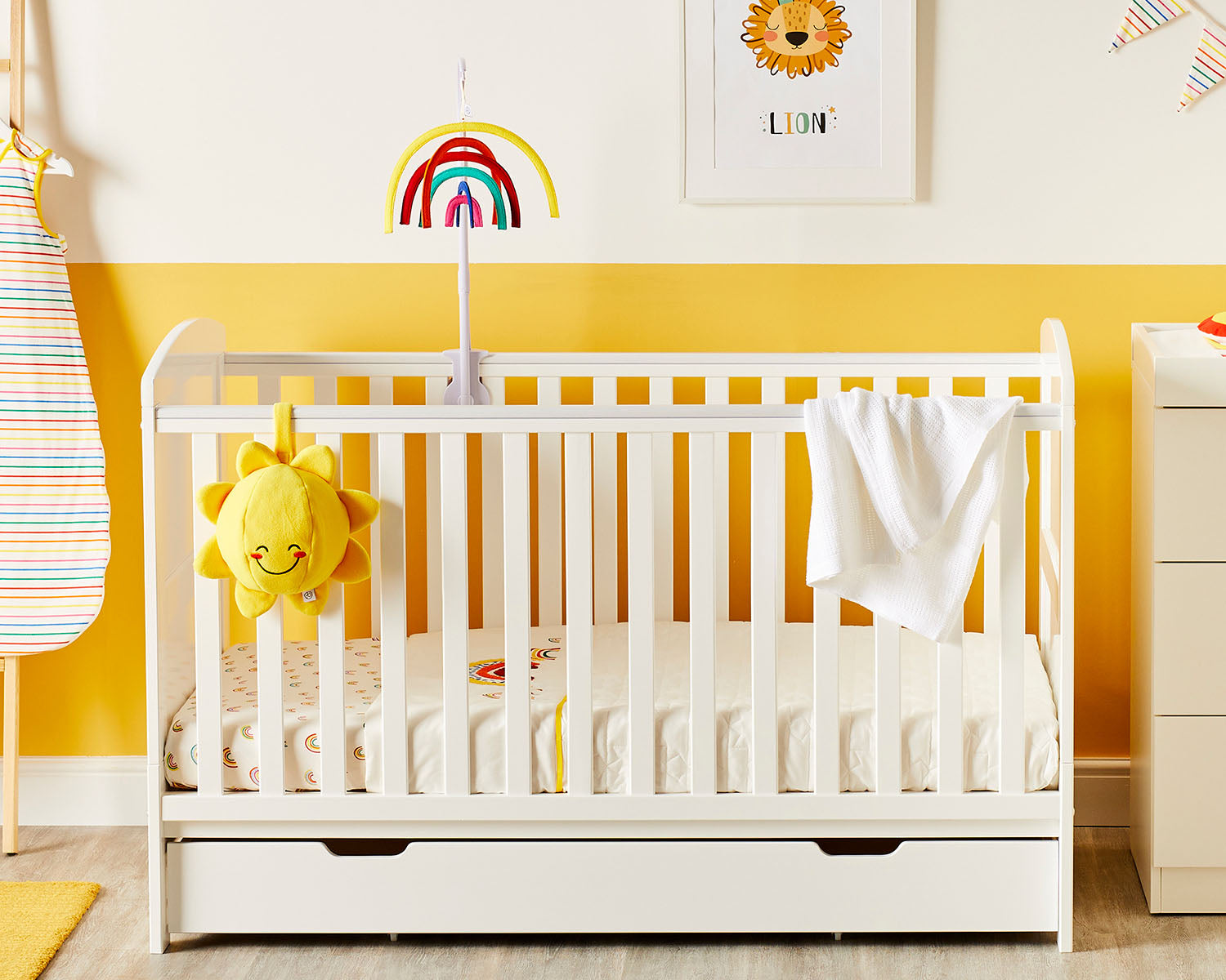 Ickle Bubba Coleby Classic Cot Bed with Under Drawer in a bright yellow nursery room