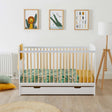 Animal-themed nursery room with an Ickle Bubba Coleby Scandi 2-in-1 Cot Bed with Under Drawer