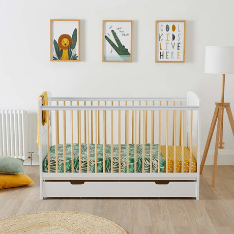 Animal-themed nursery room with an Ickle Bubba Coleby Scandi 2-in-1 Cot Bed with Under Drawer