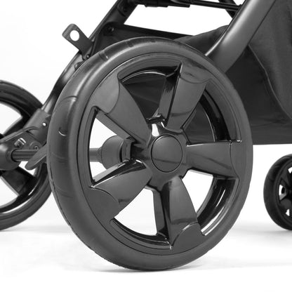 close-up shot of wheels of Ickle Bubba Comet 3-in-1 Travel System with Astral Car Seat in Black color