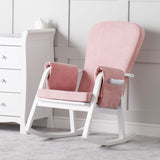 Dursley Rocking Chair in Blush Pink colour beside a nursery changer