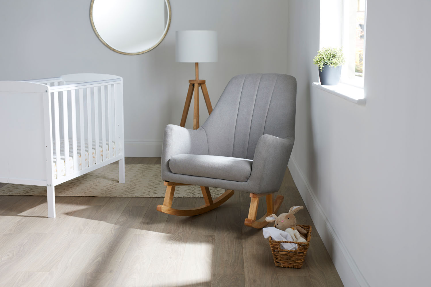 Nursery room with cot bed and an Ickle Bubba Eden Deluxe Nursery Chair in Pearl Grey colour