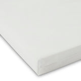 corner of Ickle Bubba Fibre Cot Mattress in white colour - washable  and breathable