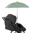 Ickle Bubba Parasol Universal Travel Accessory in Sage Green colour attached to a black Ickle Bubba stroller