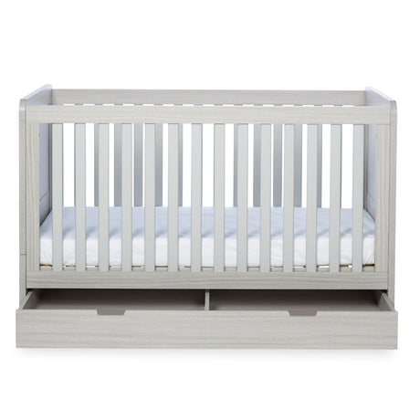 Front angle of Ickle Bubba Pembrey 2-in-1 Cot Bed with opened Under Drawer in Ash Grey colour with Fibre Cot Mattress