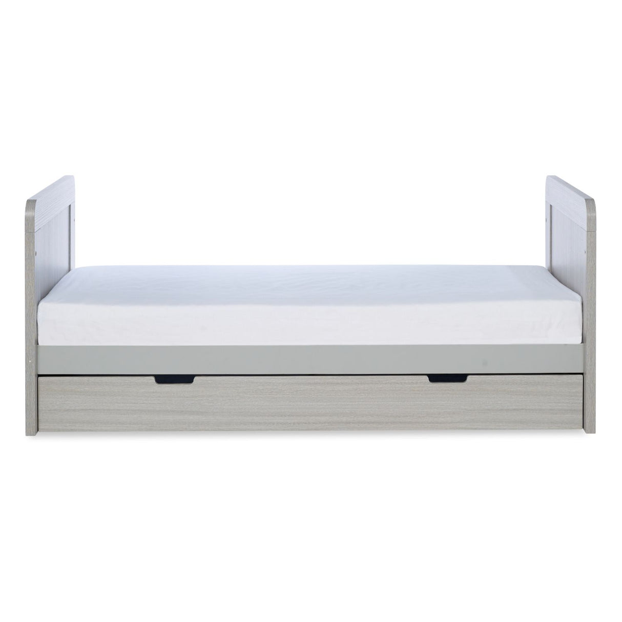 Front angle of Ickle Bubba Pembrey Cot Bed with Under Drawer in Ash Grey colour with Fibre Cot Mattress in toddler bed mode