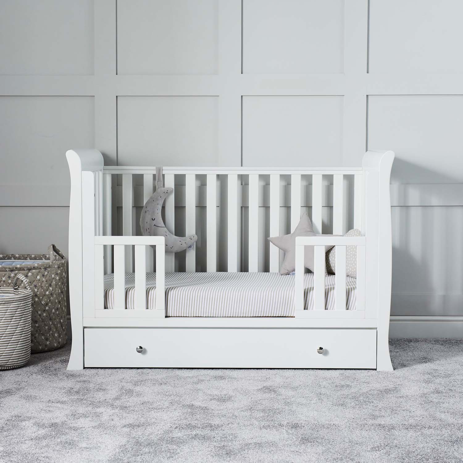 Ickle Bubba Snowdon Mini Cot Bed converted into a bed with toddler rails