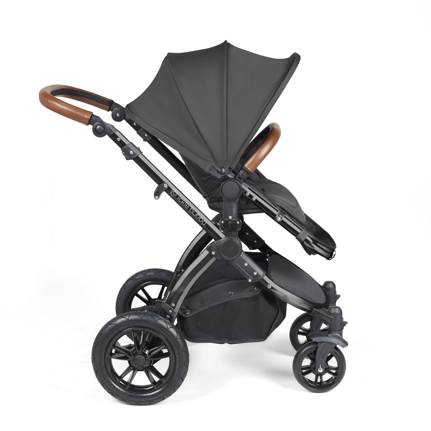 Side view of Ickle Bubba Stomp Luxe Pushchair with seat unit attached in Charcoal Grey colour with tan handle