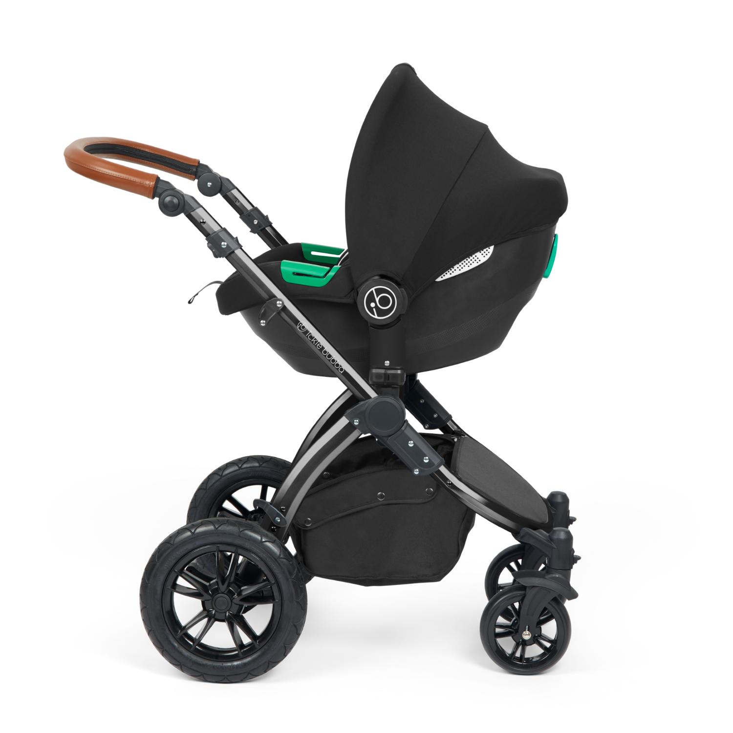 Ickle Bubba Stomp Luxe Pushchair with Cirrus i-Size car seat attached in Charcoal Grey colour with tan handle