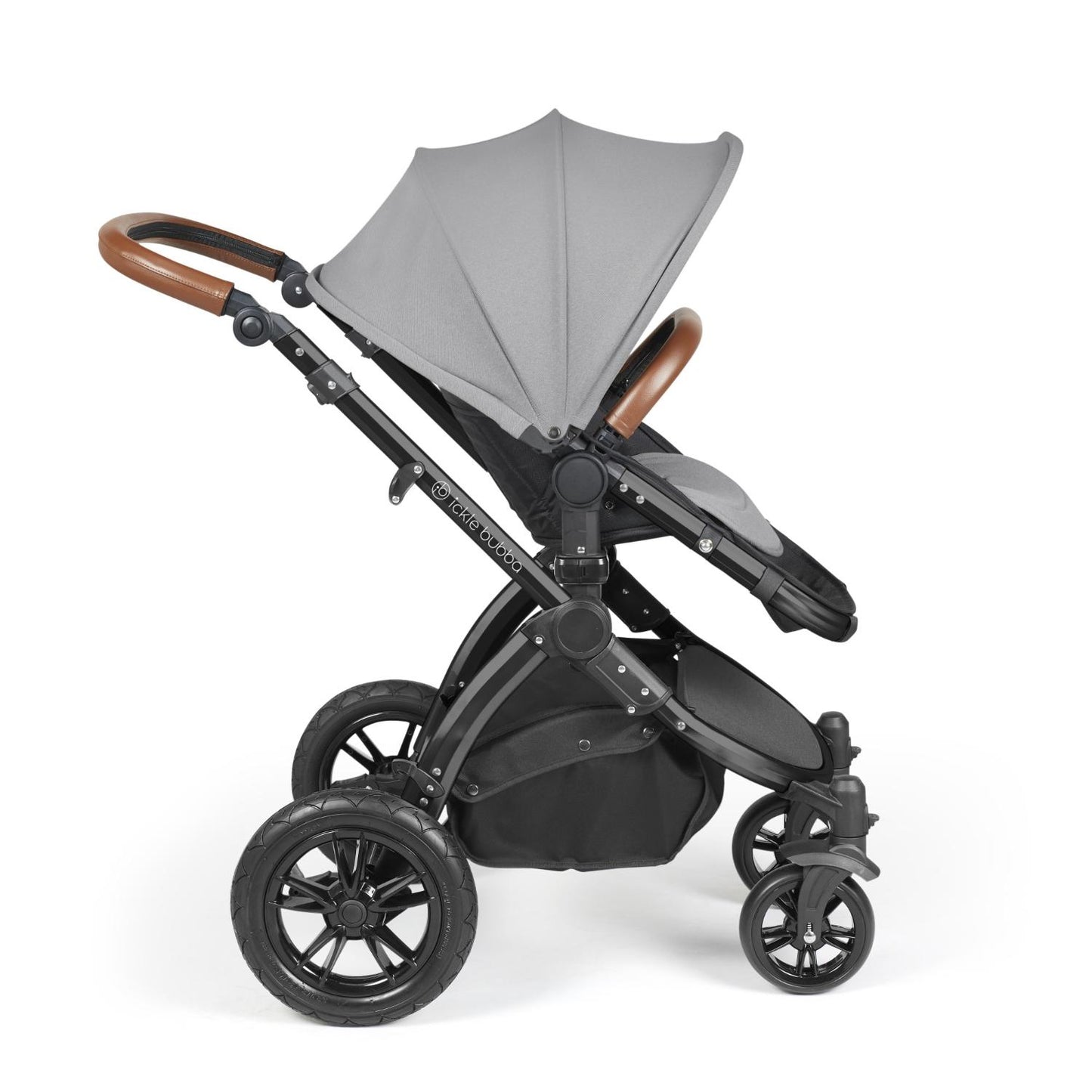 Side view of Ickle Bubba Stomp Luxe Pushchair with seat unit attached in Pearl Grey colour with tan handle