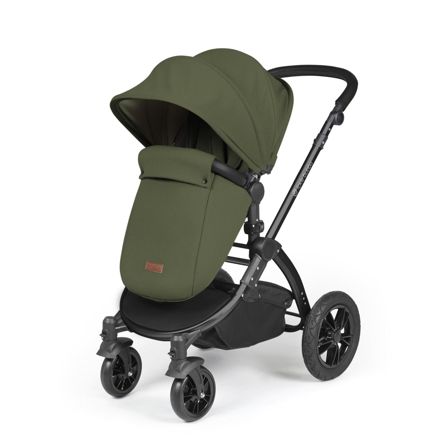 Ickle Bubba Stomp Luxe Pushchair with foot warmer attached in Woodland green colour