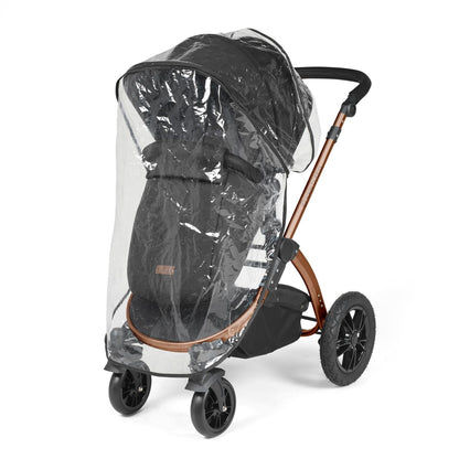 Rain cover placed on an Ickle Bubba Stomp Luxe Pushchair in Midnight black colour with bronze chassis