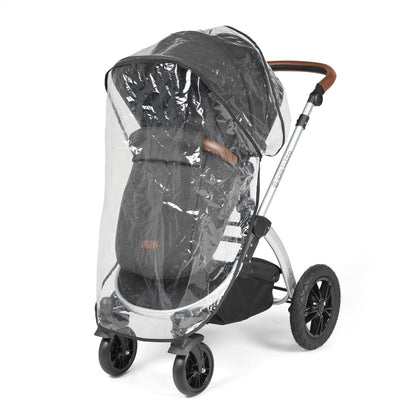 Rain cover placed on an Ickle Bubba Stomp Luxe Pushchair in Charcoal Grey colour with silver chassis and tan handle