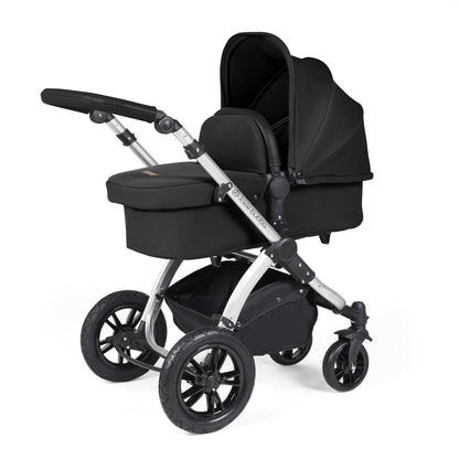 Ickle Bubba Stomp Luxe Pushchair with carrycot attached in Midnight black colour with silver chassis