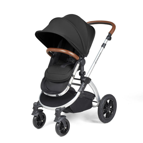 Ickle Bubba Stomp Luxe Pushchair with seat unit attached in Midnight black colour with silver chassis and tan handle