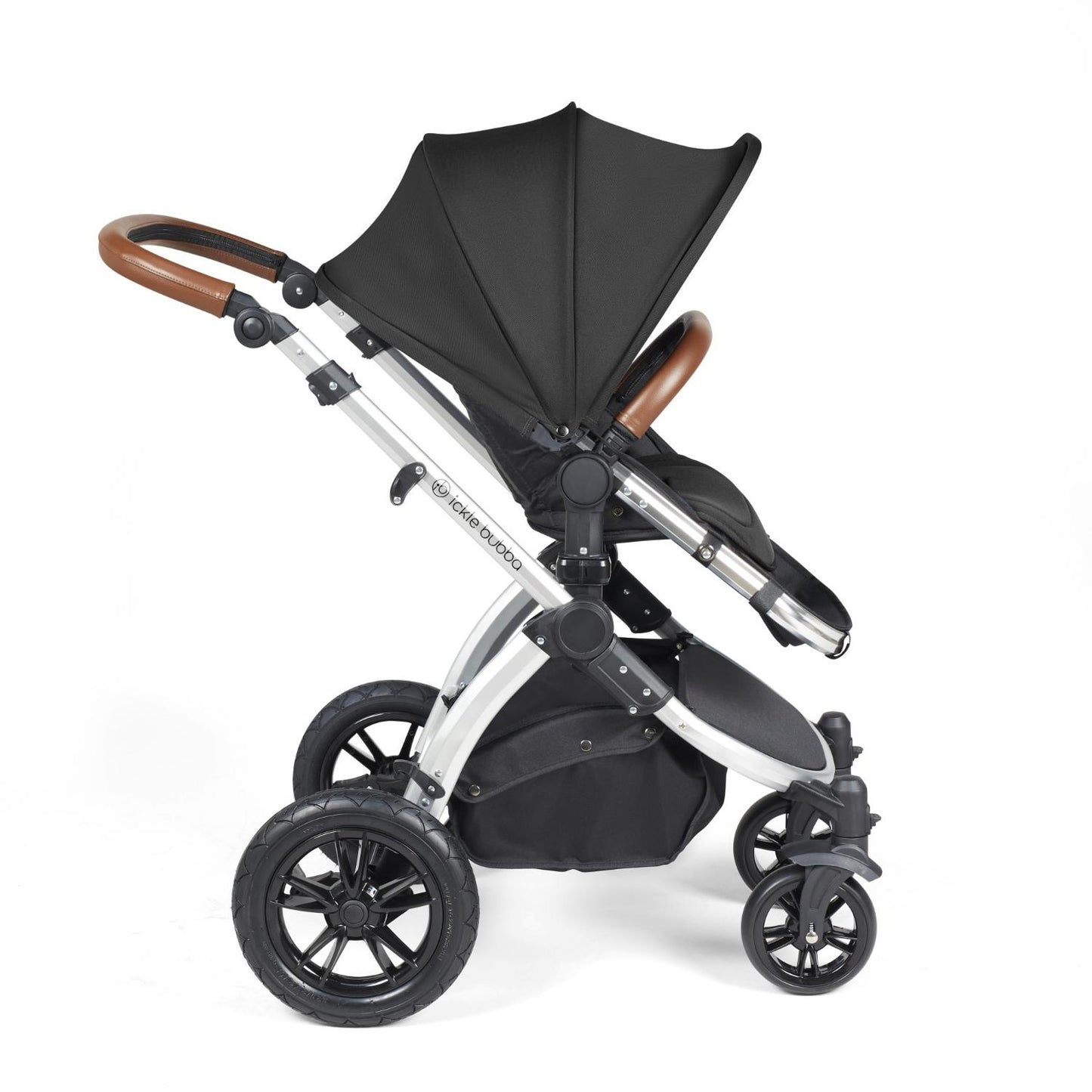 Side view of Ickle Bubba Stomp Luxe Pushchair with seat unit attached in Midnight black colour with silver chassis and tan handle