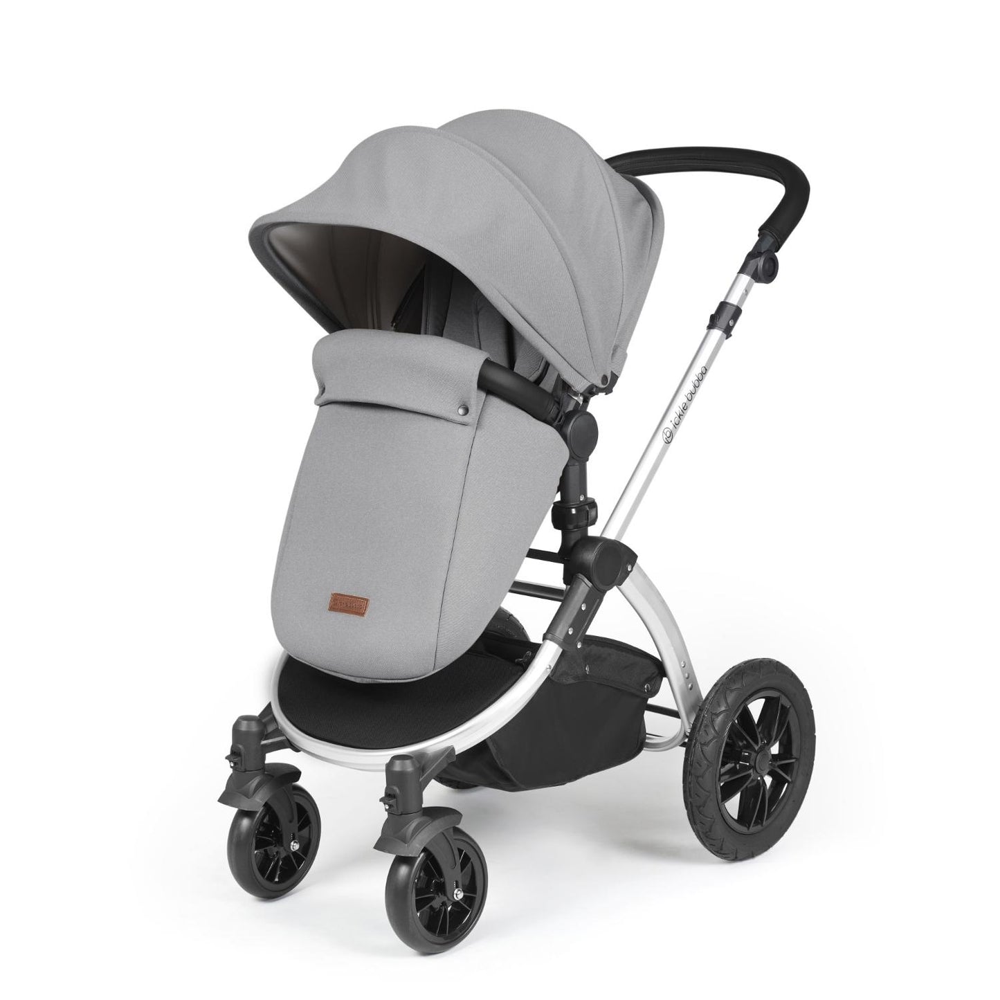 Ickle Bubba Stomp Luxe Pushchair with foot warmer attached in Pearl Grey colour with silver chassis