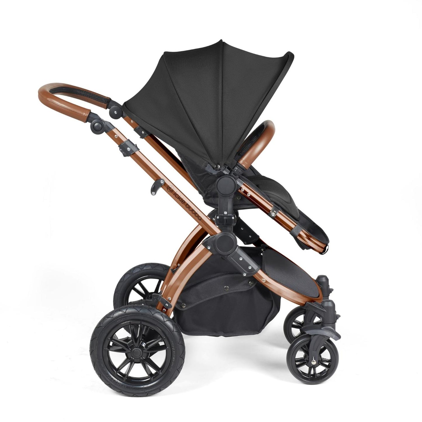 Side view of Ickle Bubba Stomp Luxe Pushchair with seat unit attached in Midnight black colour with bronze chassis and tan handle