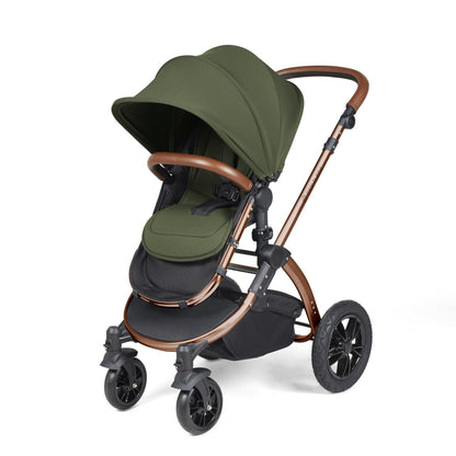Ickle Bubba Stomp Luxe Pushchair with seat unit attached in Woodland green colour with bronze chassis and tan handle