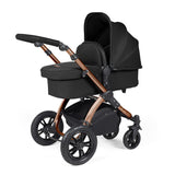 Ickle Bubba Stomp Luxe Pushchair with carrycot attached in Midnight black colour with bronze chassis