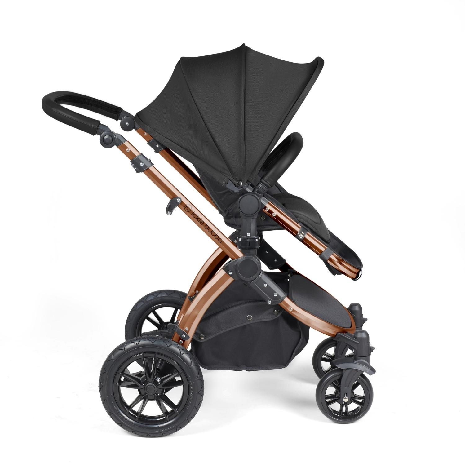 Side view of Ickle Bubba Stomp Luxe Pushchair with seat unit attached in Midnight black colour with bronze chassis