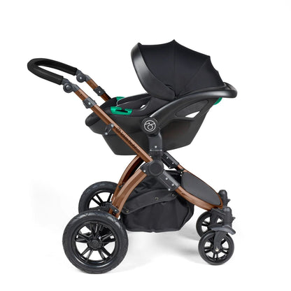 Ickle Bubba Stomp Luxe Pushchair with Stratus i-Size car seat attached in Midnight black colour with bronze chassis