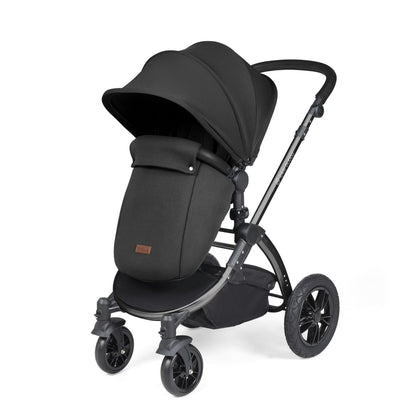 Ickle Bubba Stomp Luxe Pushchair with foot warmer attached in Midnight black colour