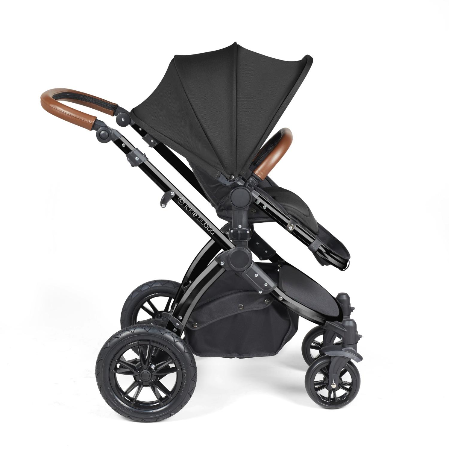 Side view of Ickle Bubba Stomp Luxe Pushchair with seat unit attached in Midnight black colour with tan handle