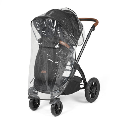 Rain cover placed on an Ickle Bubba Stomp Luxe Pushchair in Midnight black colour with tan handle