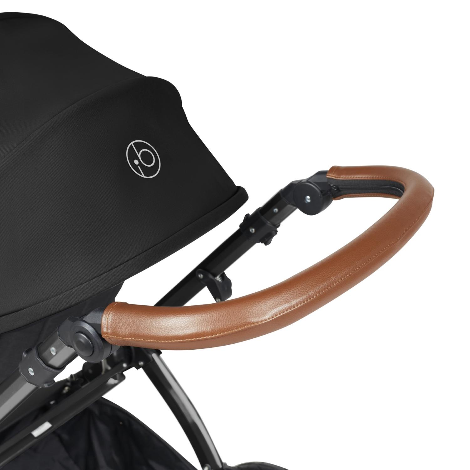 Handlebar detail of Ickle Bubba Stomp Luxe Pushchair in Midnight black colour with tan handle