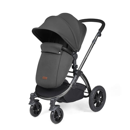 Ickle Bubba Stomp Luxe Pushchair with foot warmer attached in Charcoal Grey colour