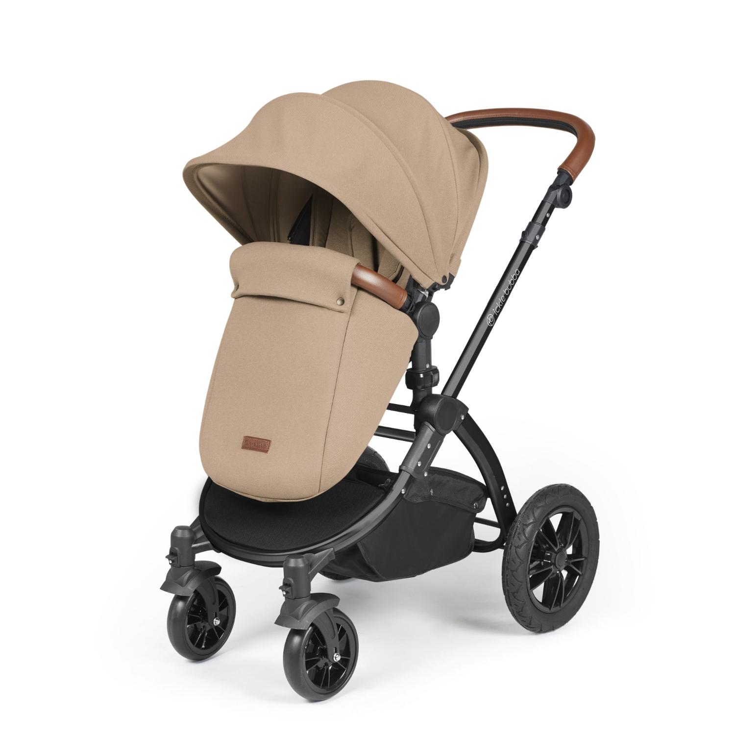 Ickle Bubba Stomp Luxe Pushchair with foot warmer attached in Desert beige colour with tan handle