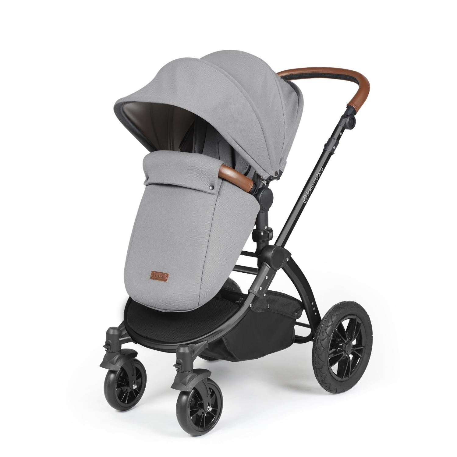 Ickle Bubba Stomp Luxe Pushchair with foot warmer attached in Pearl Grey colour with tan handle