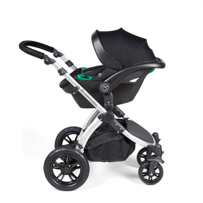 Ickle Bubba Stomp Luxe Pushchair with Stratus i-Size car seat attached in Midnight black colour with silver chassis
