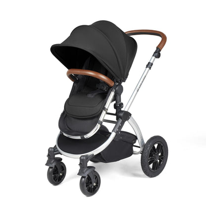 Ickle Bubba Stomp Luxe Pushchair with seat unit attached in Midnight black colour with silver chassis and tan handle