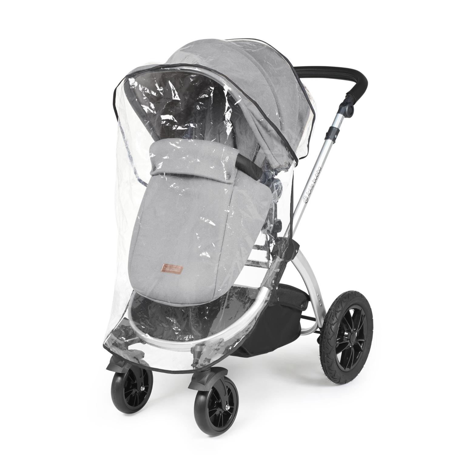 Rain cover placed on an Ickle Bubba Stomp Luxe Pushchair in Pearl Grey colour with silver chassis