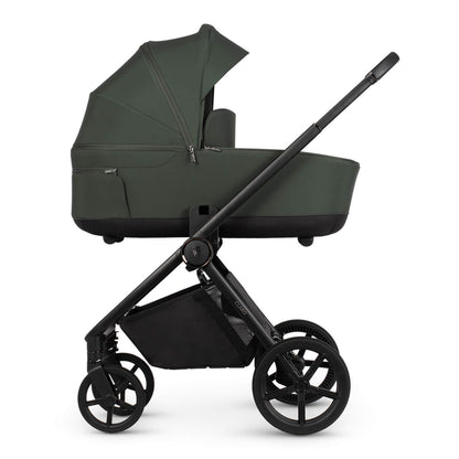 Venicci Claro carrycot in Forest green colour placed in the Claro frame