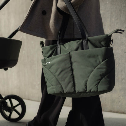 Close-up shot of a person carrying the stylish Venicci Claro bag in Forest  green colour