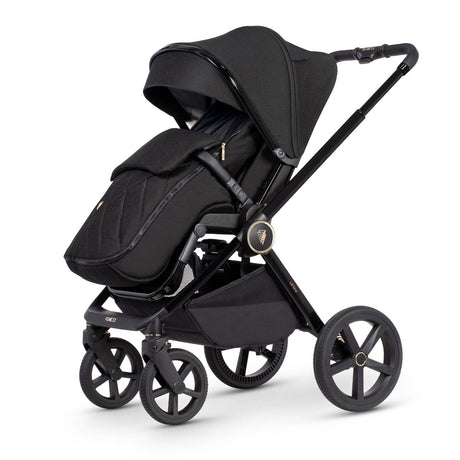 Venicci Upline 2-in-1 Pram in All Black colour with seat unit and footmuff attached in forward-facing position