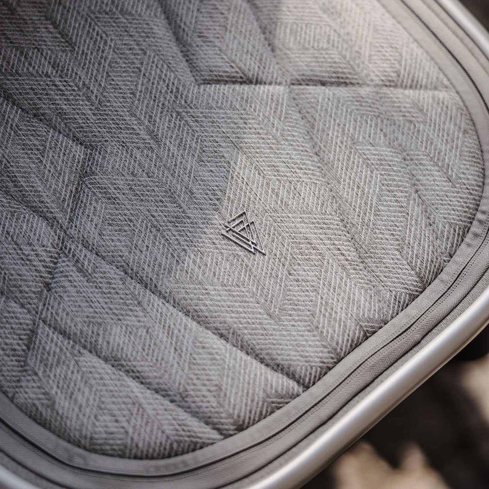 Close-up shot of logo in Venicci Upline Pram in Moonstone colour